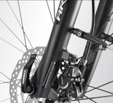 vélo électrique tout chemin équipé de frein tektro